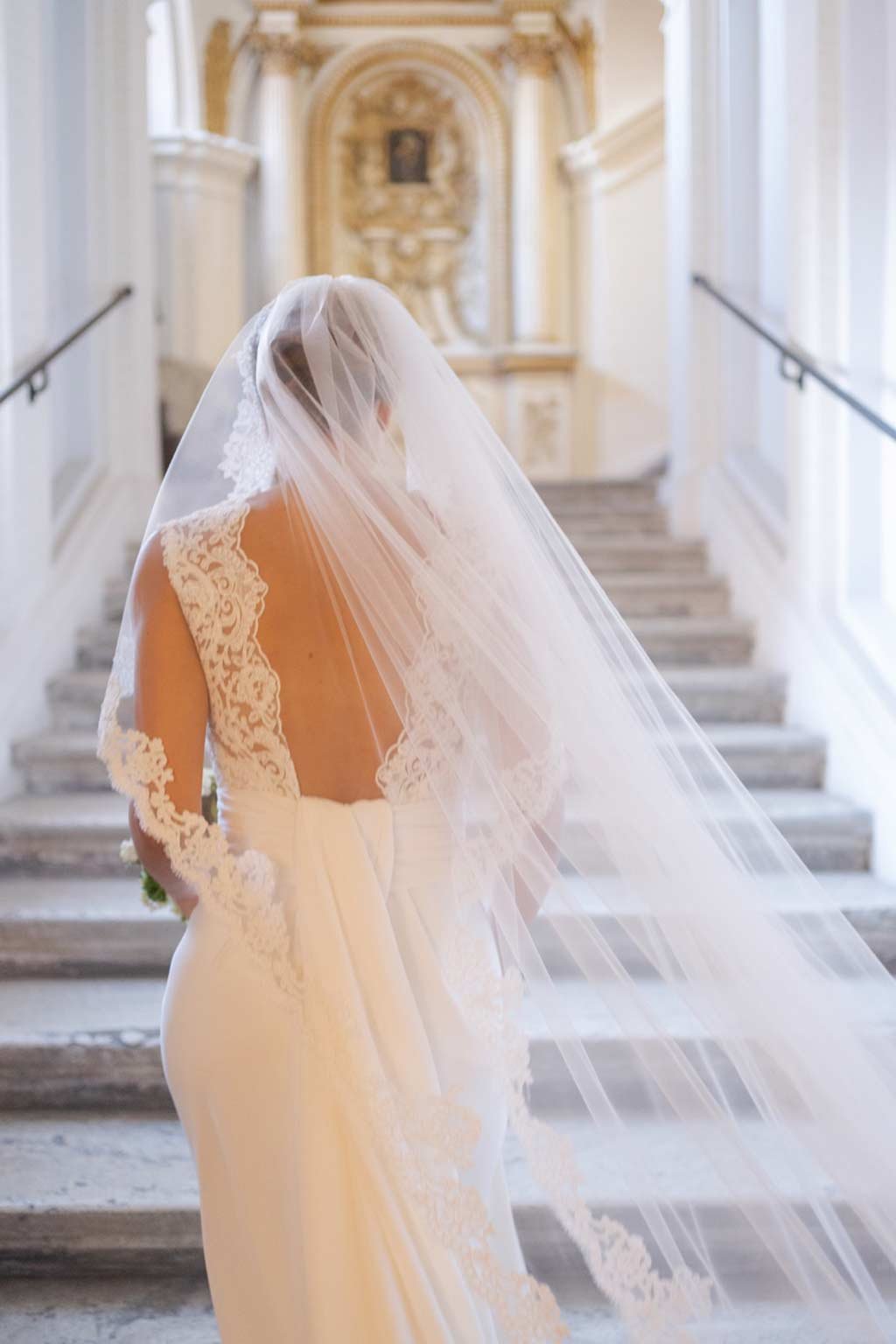 Bride walking through Donna Camilla Savelli before heading to Villa Aurelia for her wedding ceremony.