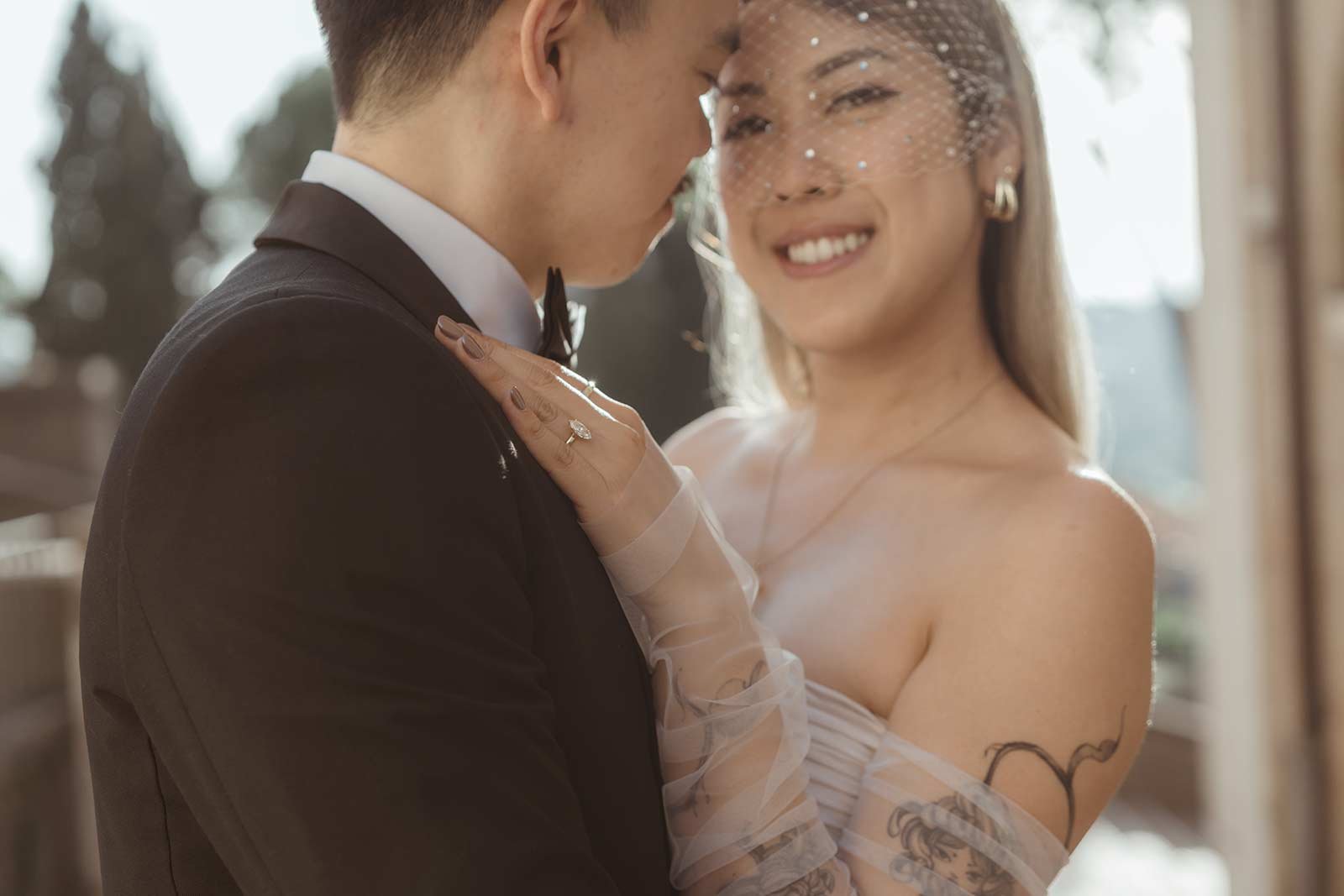 Close-up of bride showing engagement ring during Rome elopement photoshoot
