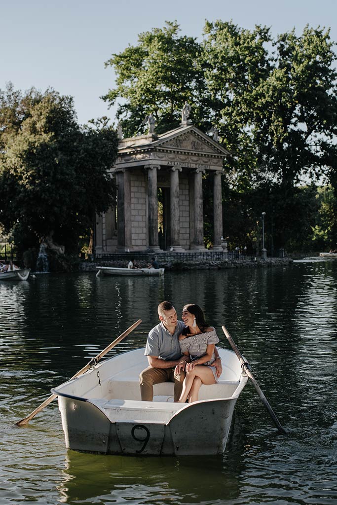 Couple in a rowboat on the lake at Villa Borghese, Rome
